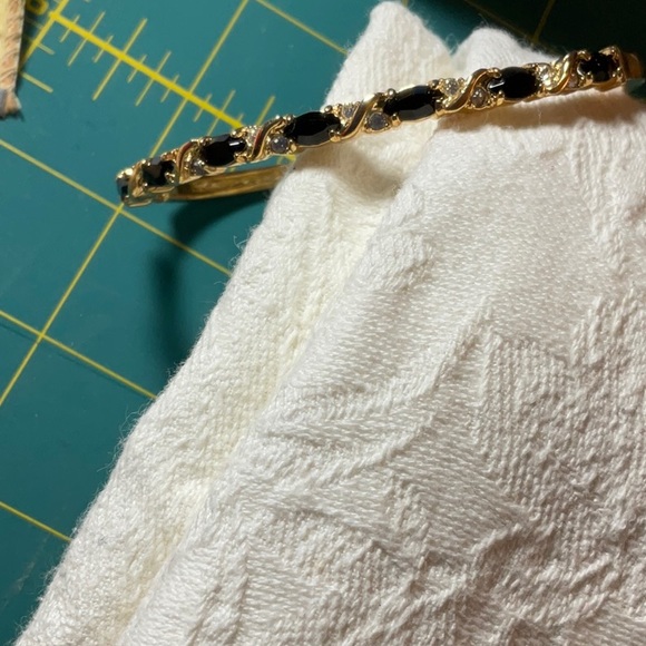 Rhinestones and Black Stones Goldtone Bangle - Picture 4 of 4